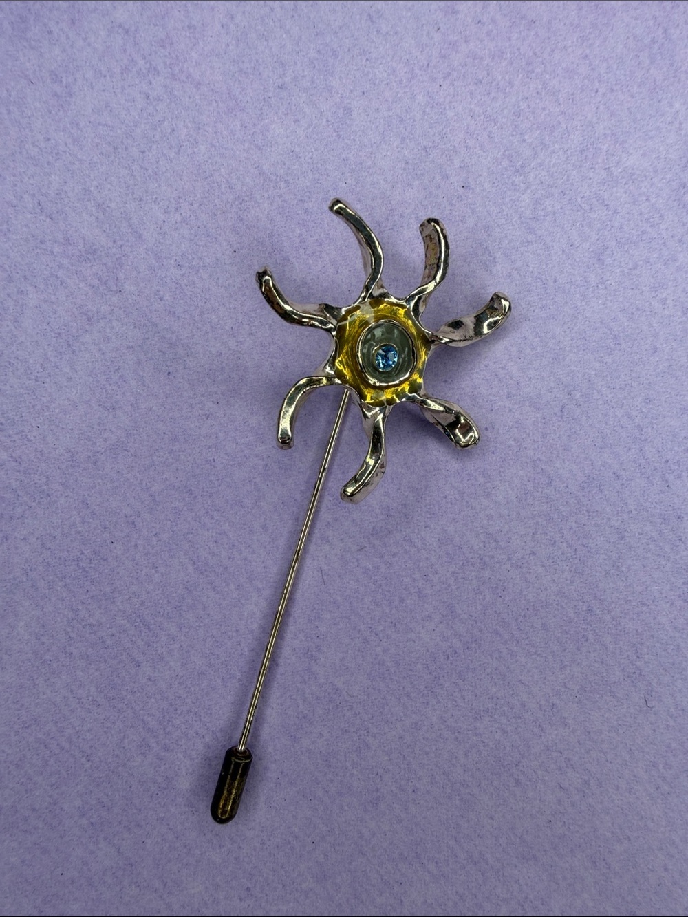 Vintage Silver Tone Sunburst Stick Brooch with Blue Center